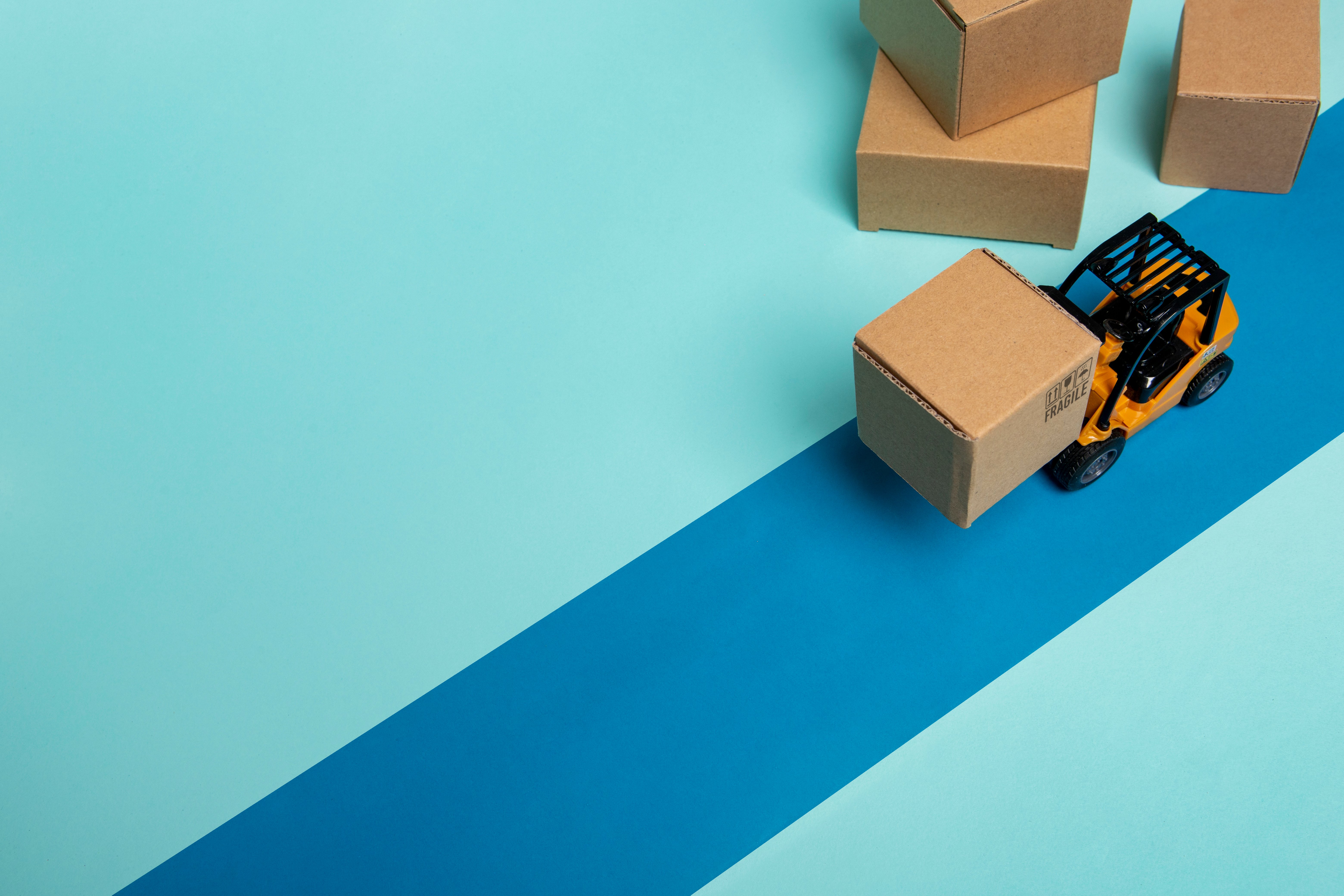 high-angle-forklift-blue-background